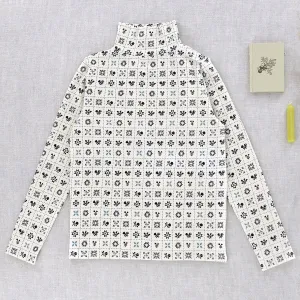 Snap Turtleneck in Cream Folk Quilt by Iver & Isla